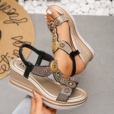 SOLORA MEDALLION WEDGE SANDALS